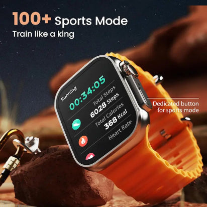 Smartwatch with orange band on a rocky surface, displaying fitness data with '100+ Sports Mode' text.